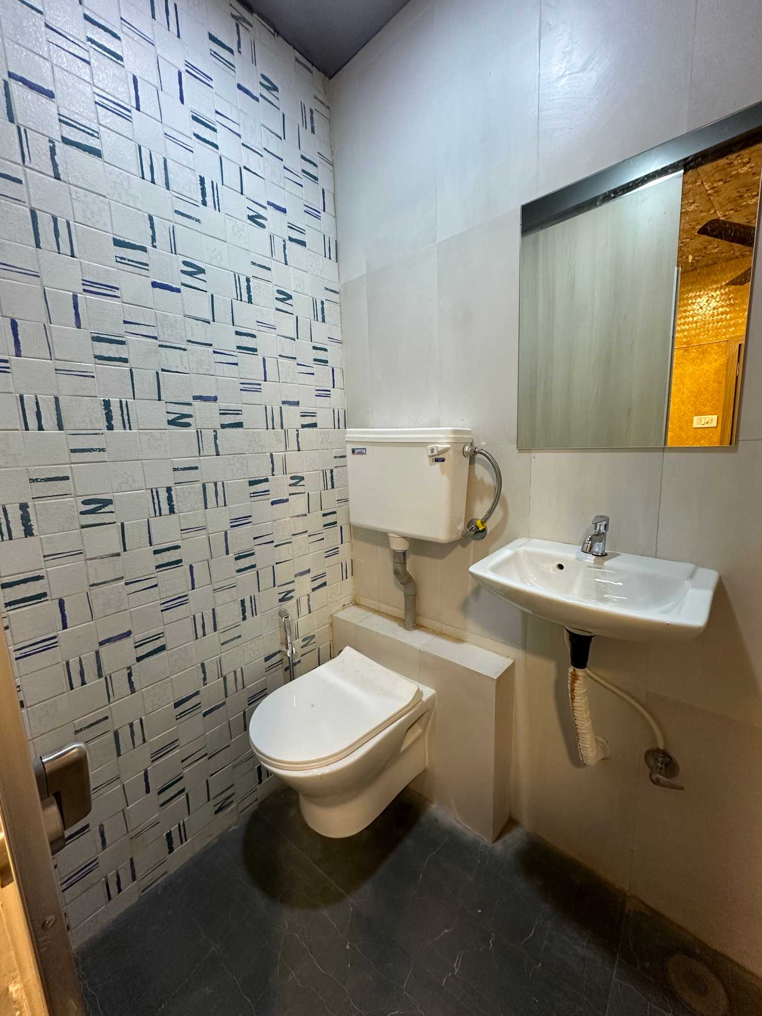 Clean attached bathroom at Zest Stays 1056